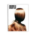 Book cover of 'Archive II: A Book About Hair' by Wendy Iles with a woman's head and hair.